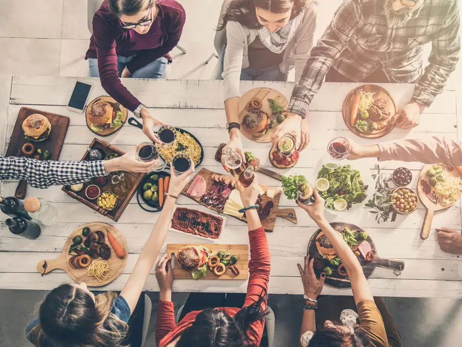 Group of dinner guests around a table
